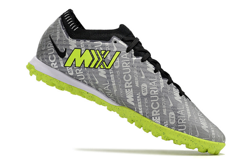 CHUTEIRA NIKE MERCURIAL AIR ZOOM VAPOR 15 ELITE SOCIETY "ANNIVERSARY 25 YEARS" - PRATA E VERDE