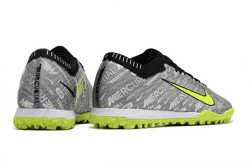 CHUTEIRA NIKE MERCURIAL AIR ZOOM VAPOR 15 ELITE SOCIETY "ANNIVERSARY 25 YEARS" - PRATA E VERDE