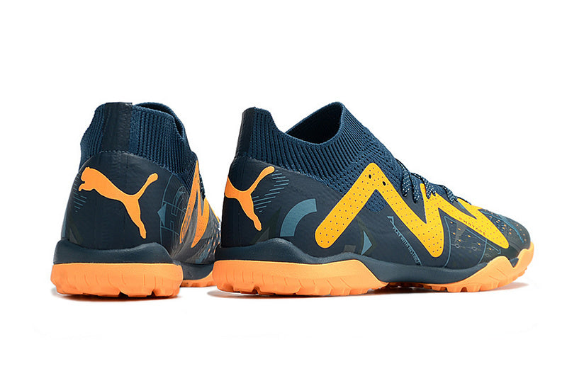CHUTEIRA PUMA FUTURE ULTIMATE SOCIETY "DNA" - AZUL E LARANJA