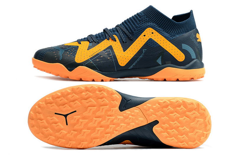 CHUTEIRA PUMA FUTURE ULTIMATE SOCIETY "DNA" - AZUL E LARANJA