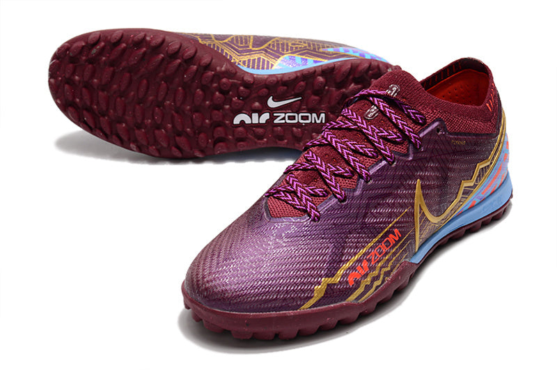 CHUTEIRA NIKE MERCURIAL AIR ZOOM VAPOR 15 ELITE SOCIETY "MBAPPÉ" - ROXA