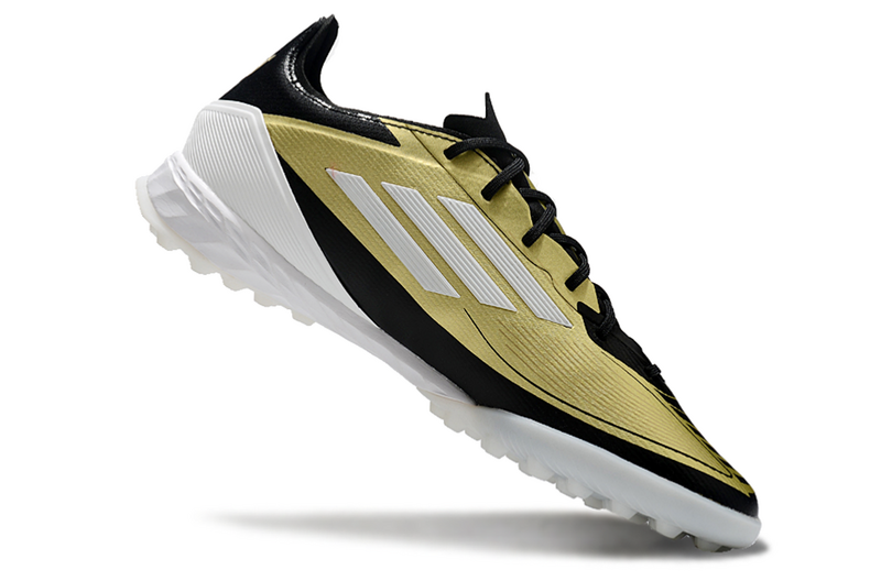 CHUTEIRA ADIDAS F50 SOCIETY "TRIUNFO DOURADO" - DOURADA E PRETA
