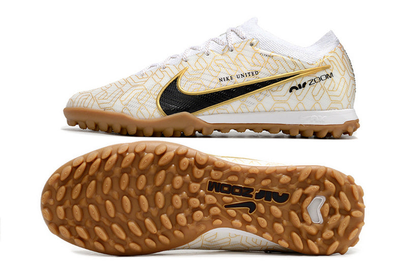 CHUTEIRA NIKE MERCURIAL AIR ZOOM VAPOR 15 ELITE SOCIETY - BRANCA E DOURADA