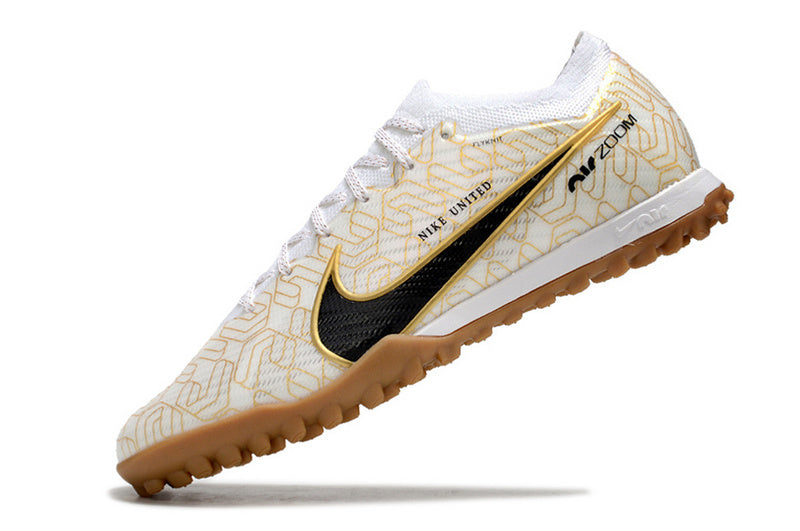 CHUTEIRA NIKE MERCURIAL AIR ZOOM VAPOR 15 ELITE SOCIETY - BRANCA E DOURADA