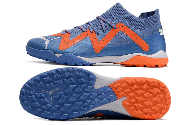 CHUTEIRA PUMA FUTURE ULTIMATE SOCIETY "SUPERCHARGE" - ROXA E LARANJA