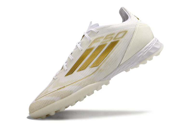CHUTEIRA ADIDAS F50 SOCIETY "DAY SPARK" - BRANCA E DOURADA